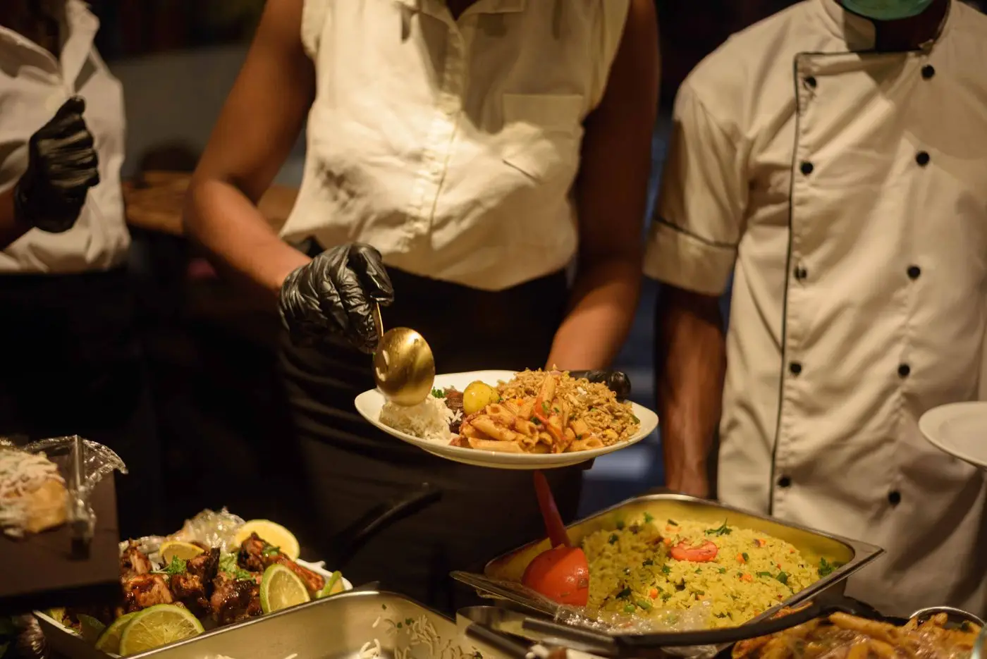 Caterers serving food at an event